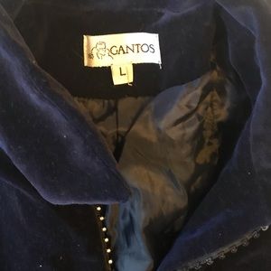 Velvet pants suit with this vest.